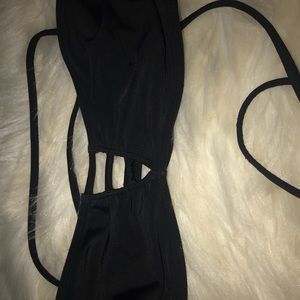Black strappy bathing suit top.